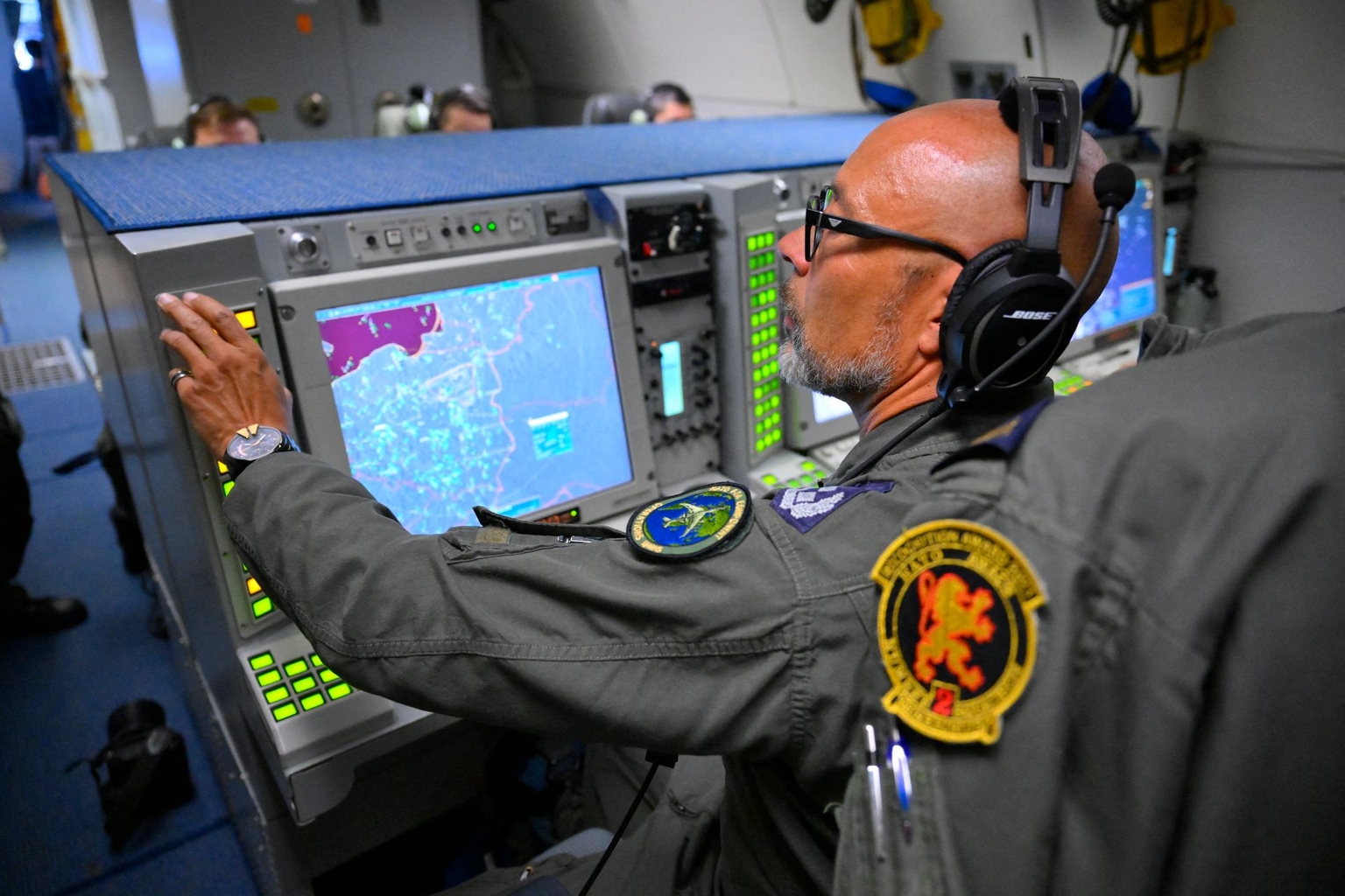A NATO AWACS tactical director assesses the air and surface situation aboard a NATO air surveillance aircraft during a flight over Polish airspace as part of the alliance’s Eastern Sentry mission on Sept. 19, 2025. A NATO AWACS tactical director assesses the air and surface situation aboard a NATO air surveillance aircraft during a flight over Polish airspace as part of the alliance’s Eastern Sentry mission on Sept. 19, 2025.