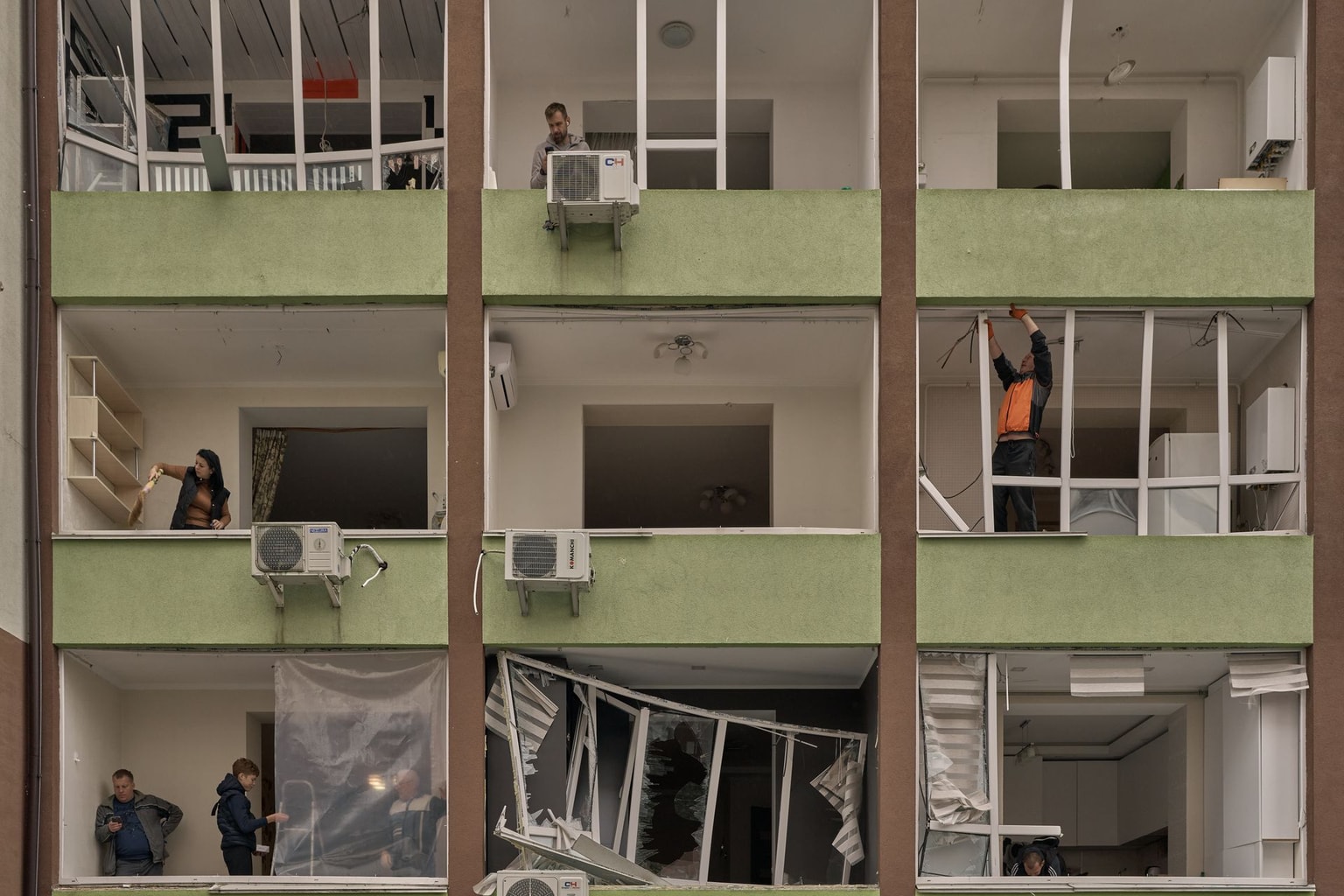 People inside the damaged apartments, following a Russian overnight attack on Kyiv, Ukraine, on Sept. 28, 2025.