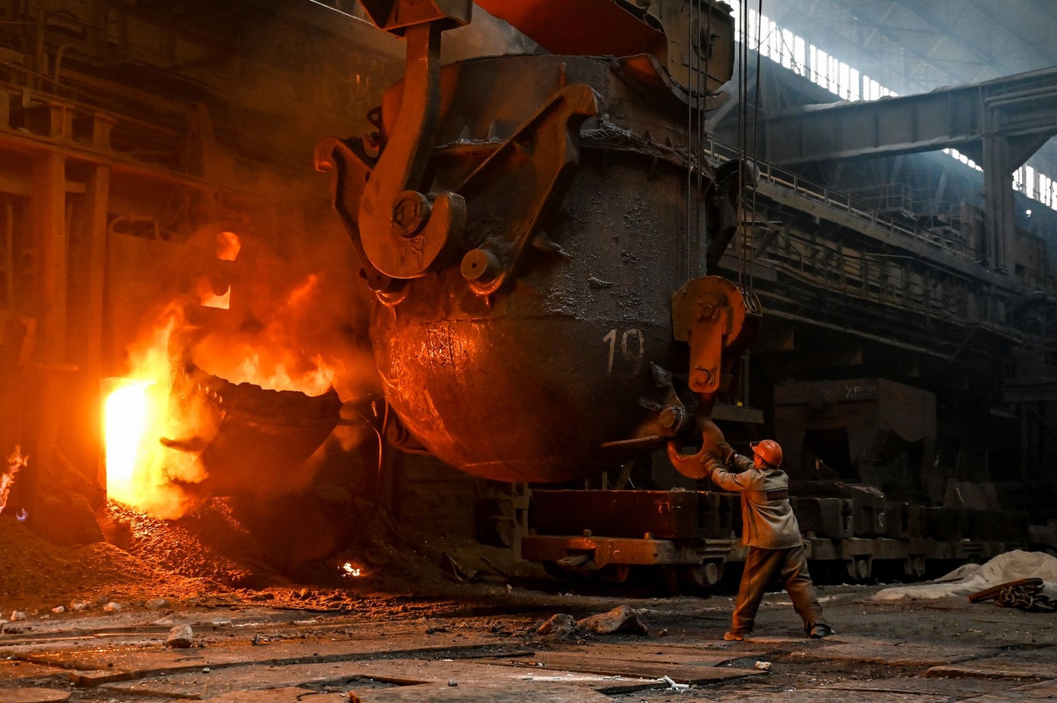 An employee works in an open-hearth furnace shop at Zaporizhstal PJSC in Zaporizhzhia, Ukraine, on Nov. 13, 2024.