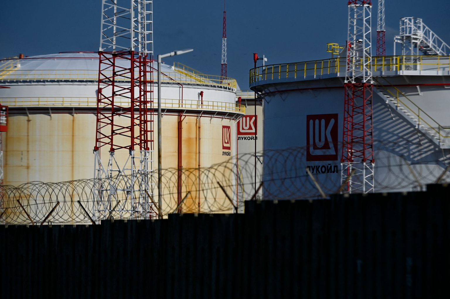 Lukoil fuel storage tanks are seen at the Rosenets Port terminal near the city of Burgas on Bulgaria’s Black Sea coast on March 17, 2022.