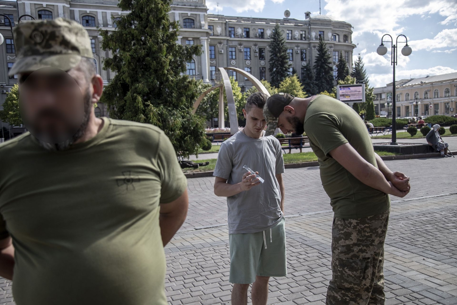 Members of the Kharkiv Regional Recruitment Office check documentation in Kharkiv, Ukraine, on Aug. 8, 2024.
