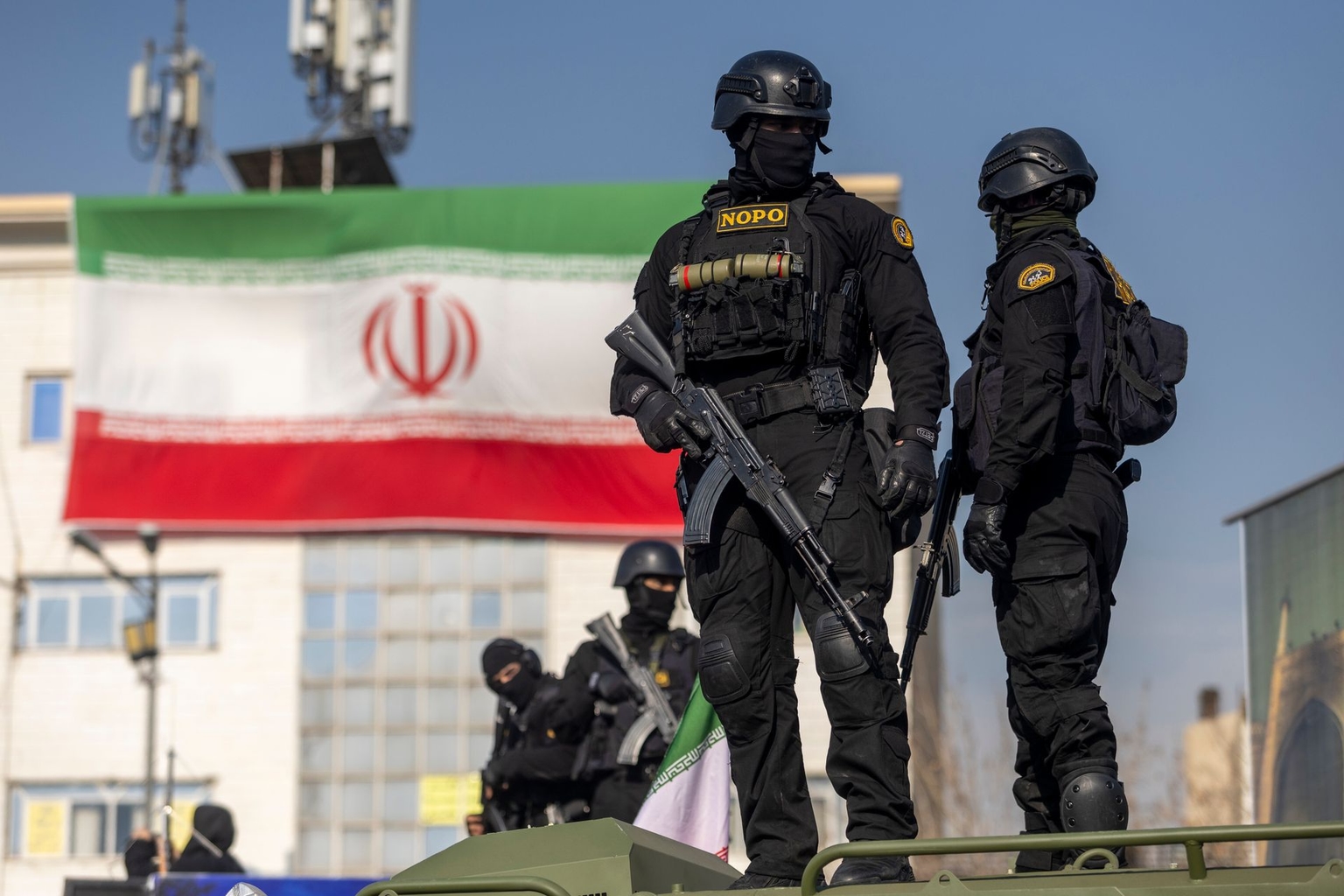 Security forces are seen during a rally in Tehran, Iran, on Jan. 12, 2026.
