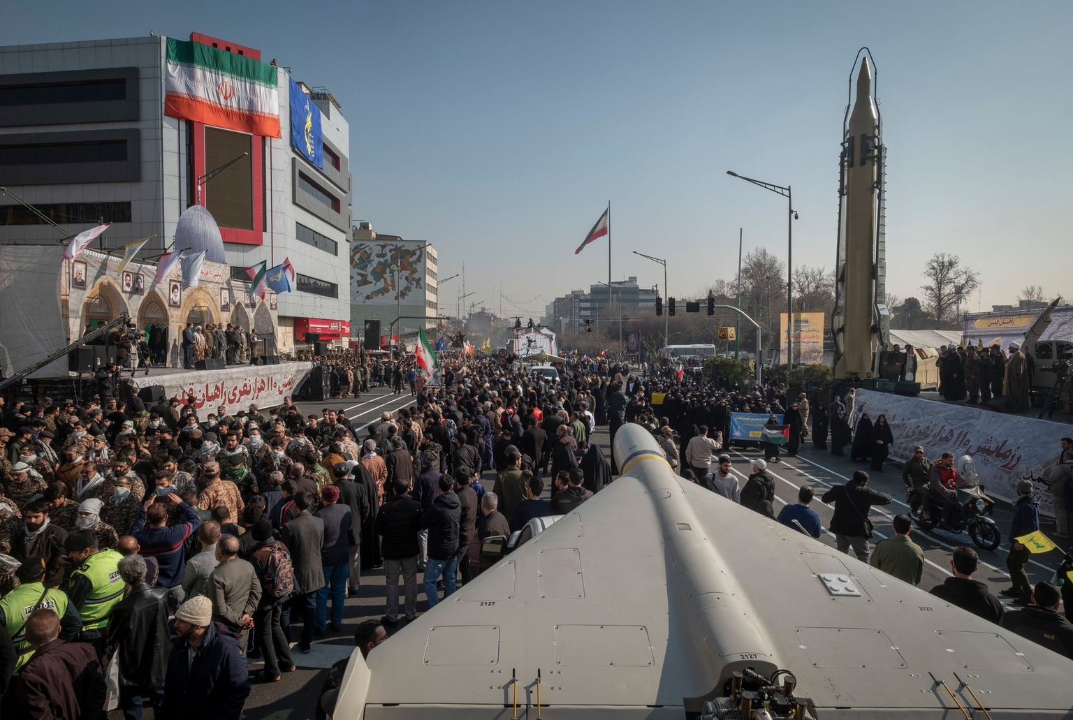 An Iranian-made Shahed-136 unmanned aerial vehicle (bottom) and an Iranian-made surface-to-surface ballistic missile are displayed during a military rally in downtown Tehran, Iran, on Jan. 10, 2025.