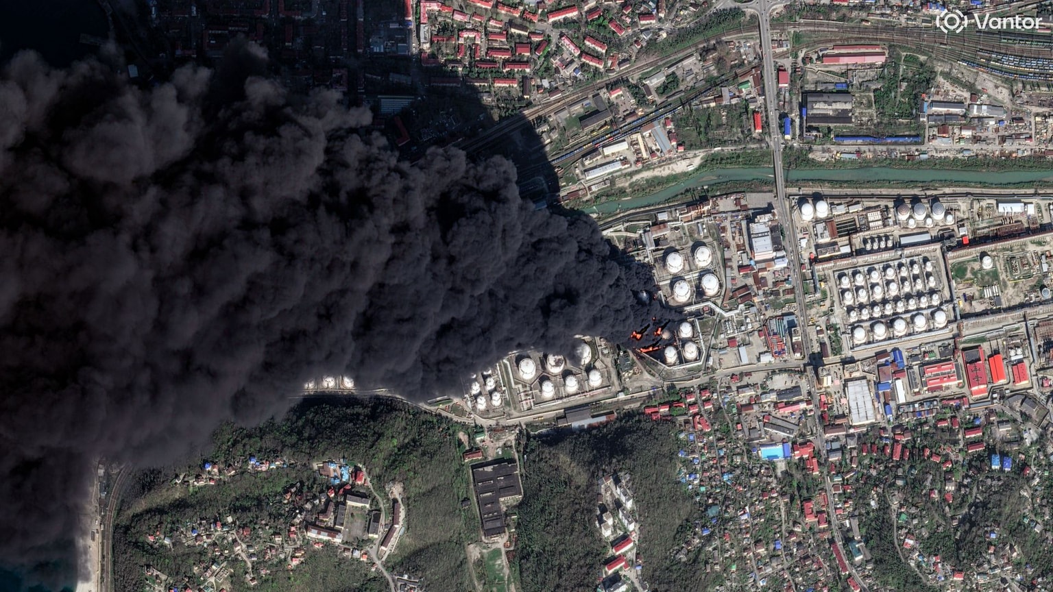 Vantor satellite image shows several oil storage tanks on fire with thick black smoke drifting south over the Black Sea at the Tuapse oil refinery on Aprl 16, 2026 (2026 Vantor)