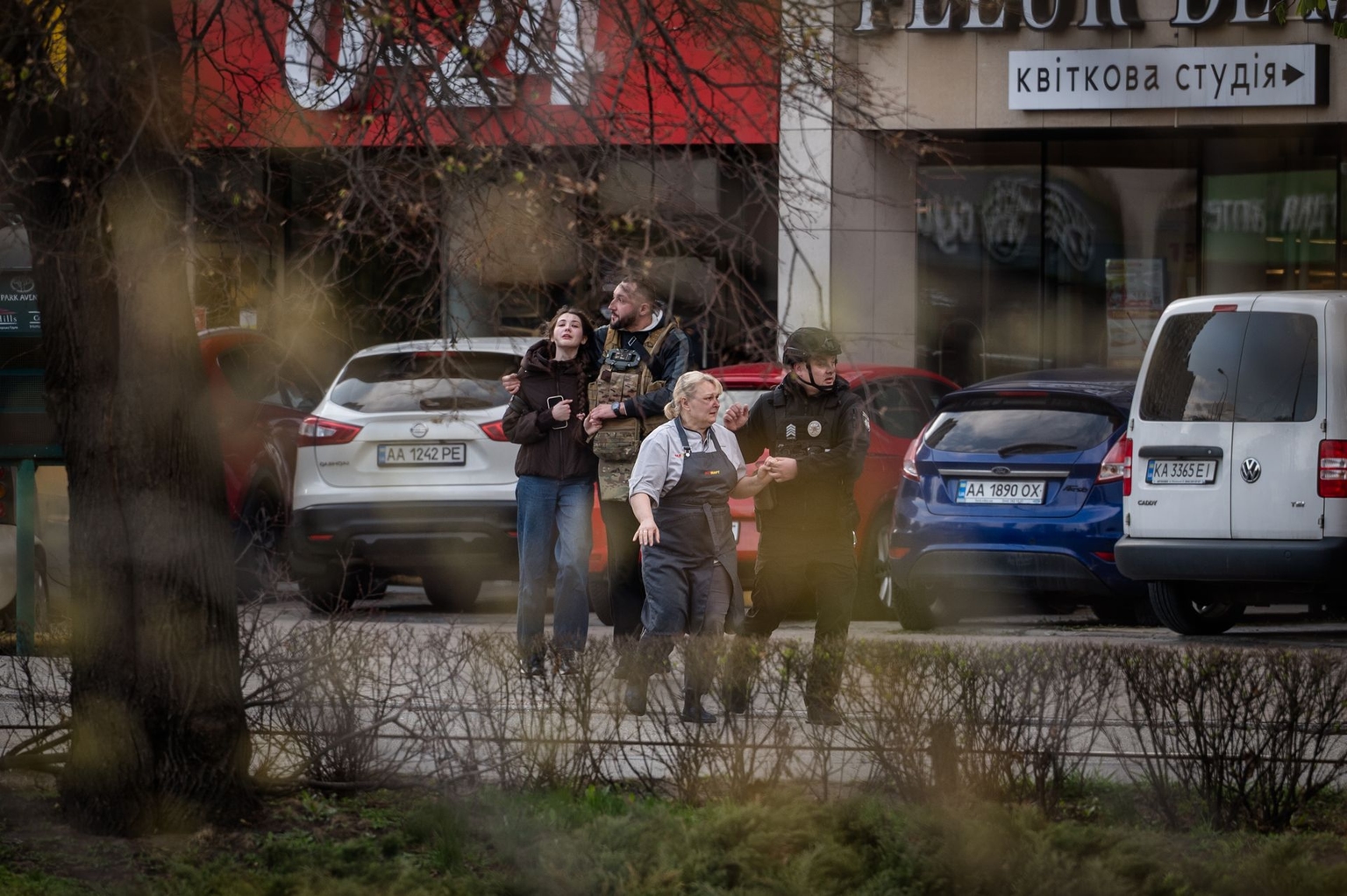 Special forces evacuate hostages from a supermarket after a gunman opened fire and took hostages in the Holosiiv distric of Kyiv, Ukraine, on April 18, 2026.