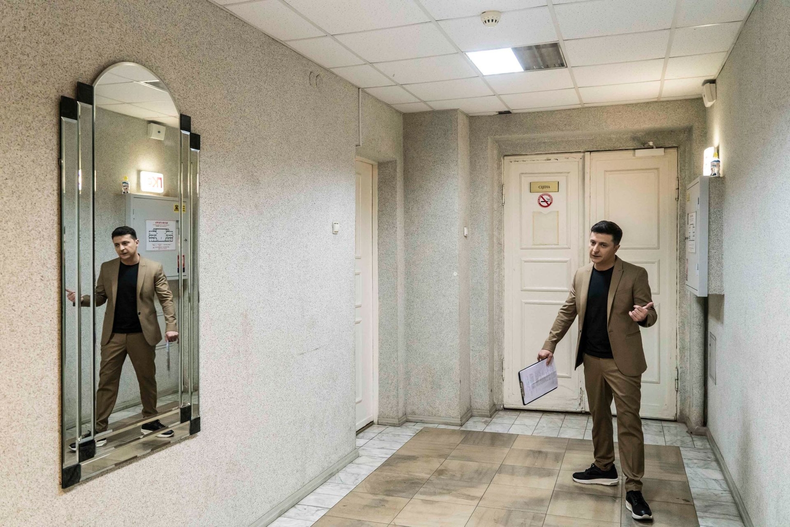 Ukrainian then-presidential candidate Volodymyr Zelensky reviews material before hosting his comedy show Liha Smikhu (League of Laughter) in Kyiv, Ukraine, on March 19, 2019.