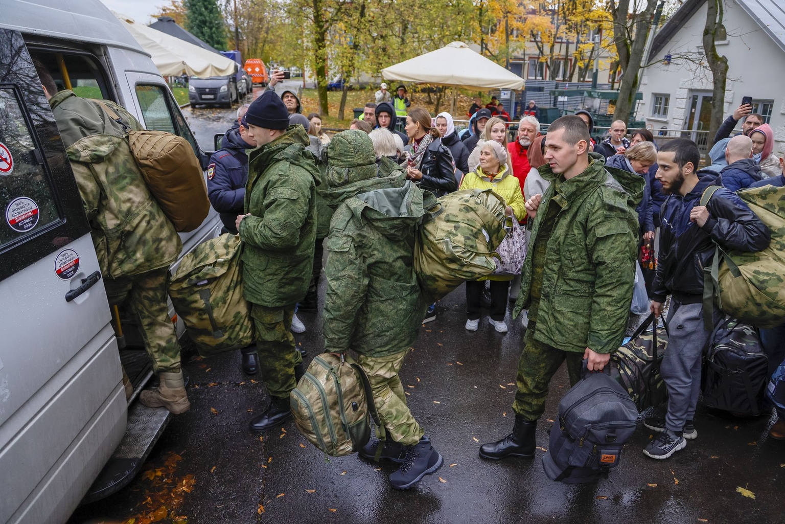 Men take part in mobilization to the Russian army in Moscow, Russia, on Oct. 4, 2022.