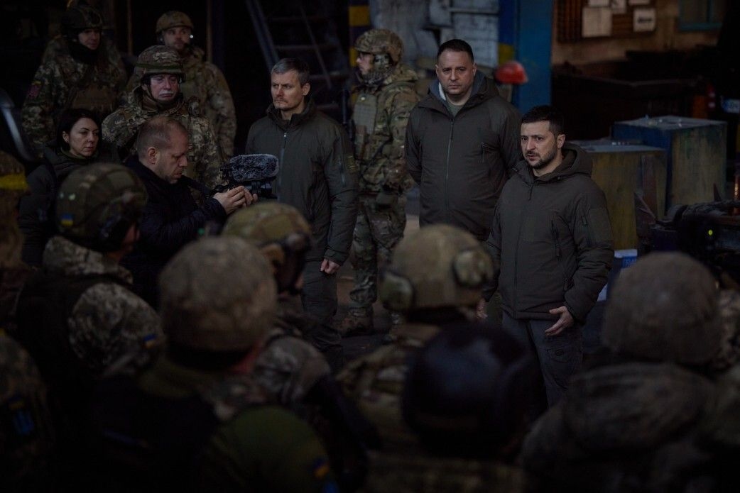 President Volodymyr Zelensky (R) meets with Ukrainian servicemen defending the city of Bakhmut during his working trip to Bakhmut, Donetsk Oblast, Ukraine, on Dec. 20, 2022.