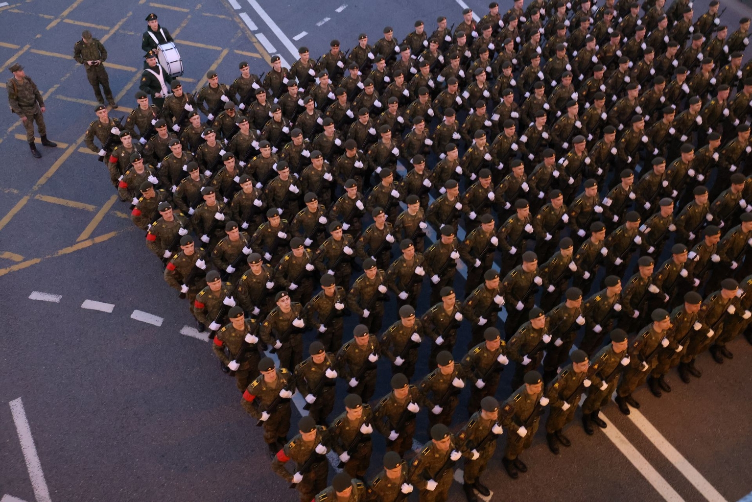 Russian military officers and cadets gather for a rehearsal of the Victory Day parade near Red Square in Moscow on May 4, 2026.