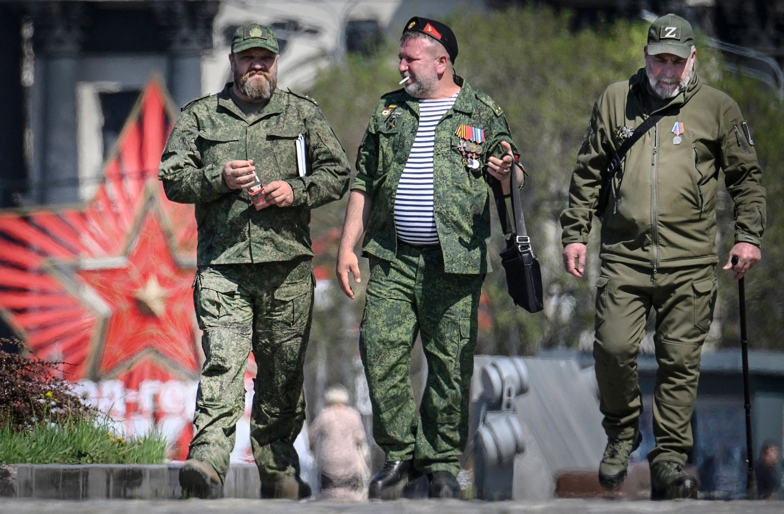Veterans of the Russian invasion of Ukraine walk outside the Victory Museum at Poklonnaya Hill in western Moscow, Russia, on May 6, 2026