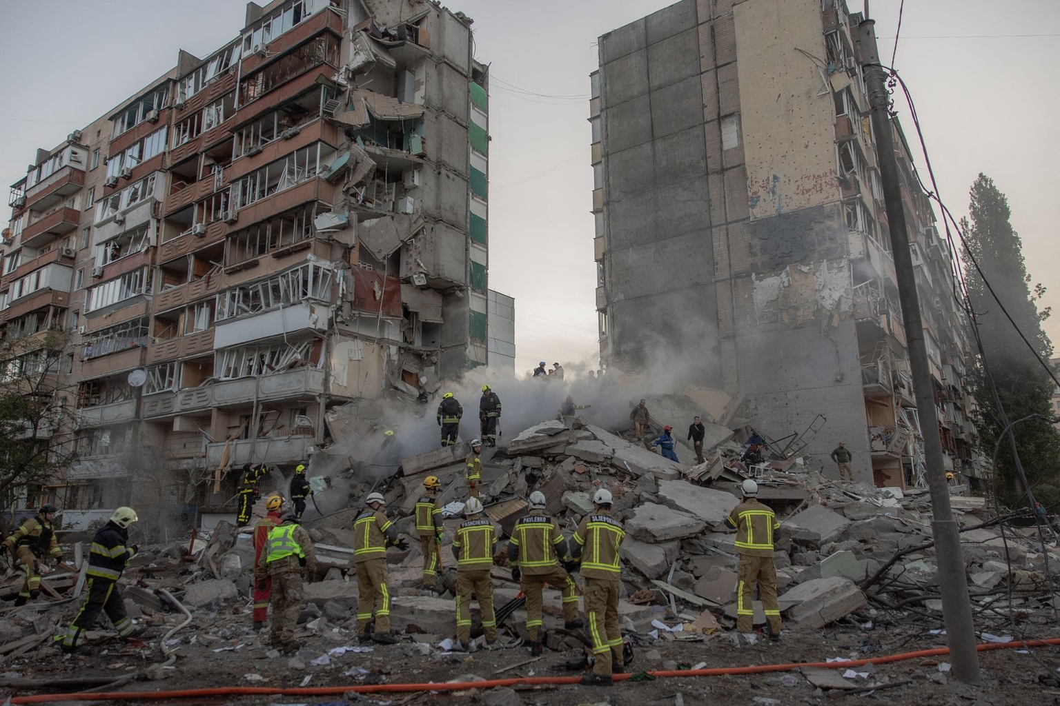 Rescuers work at a residential building destroyed following Russian drone and missile strikes in Kyiv, Ukraine, on May 14, 2026.