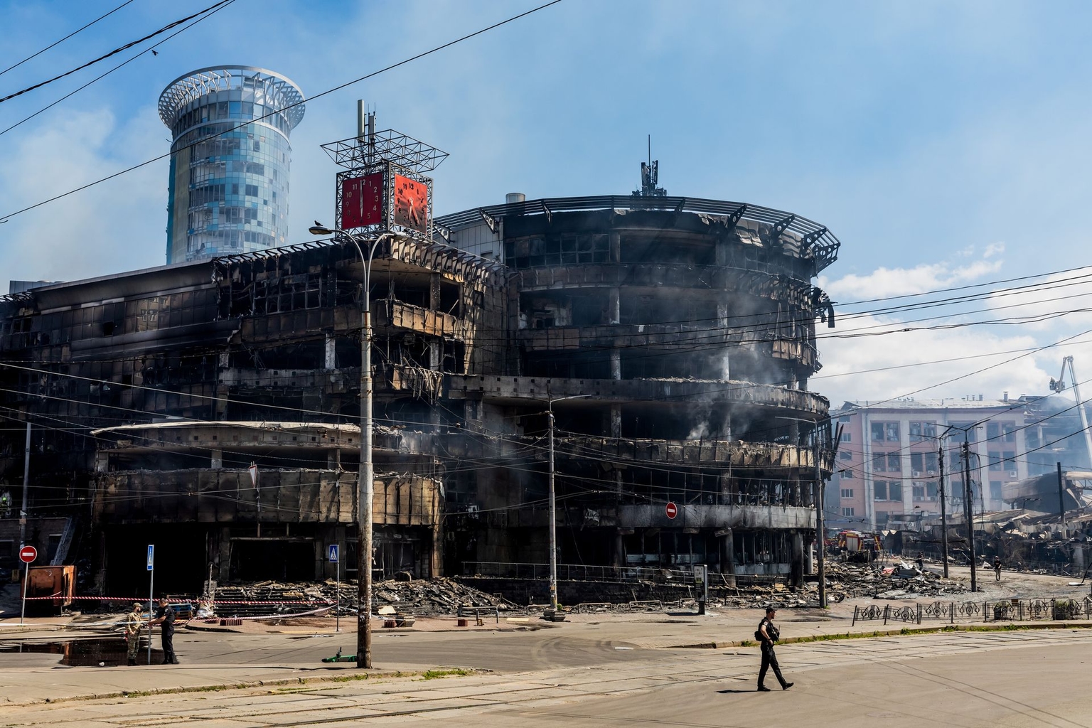 The damaged Kvadrat shopping mall smolders near Lukianivska metro station in Kyiv, Ukraine, following a Russian missile strike on May 24, 2026.