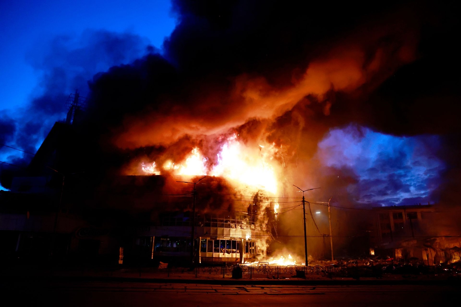 Smoke rises from a fire at a shopping mall destroyed by a Russian strike in Kyiv, Ukraine, on May 24, 2026.