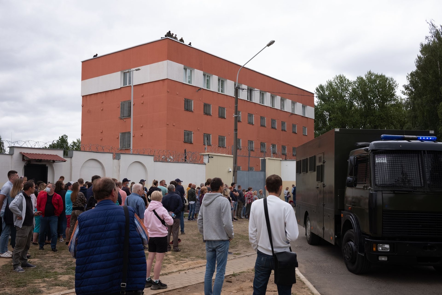 Hundreds of relatives of detained protesters stand outside a pre-trial detention center in Minsk, Belarus, on Aug. 12, 2020.