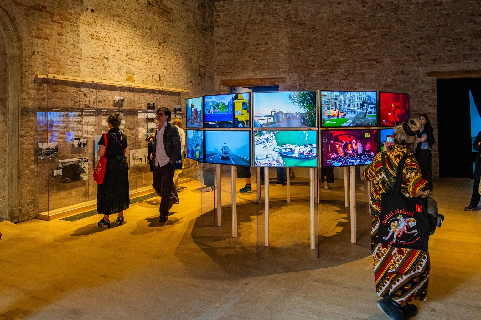 Visitors explore the Ukraine Pavilion at the Arsenale during a press preview for the 61st Venice Biennale in Venice, Italy, on May 7, 2026.