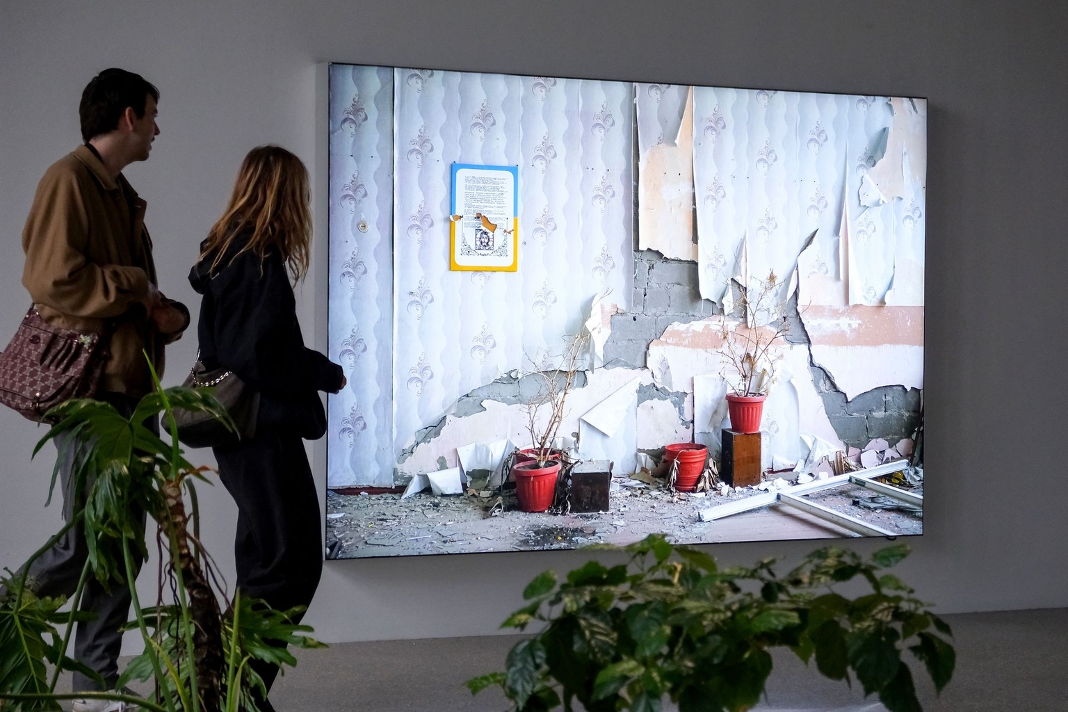 Visitors explore the collateral exhibition "Still Joy – from Ukraine into the World" at Palazzo Contarini-Polignac in Venice, Italy, on May 12, 2026