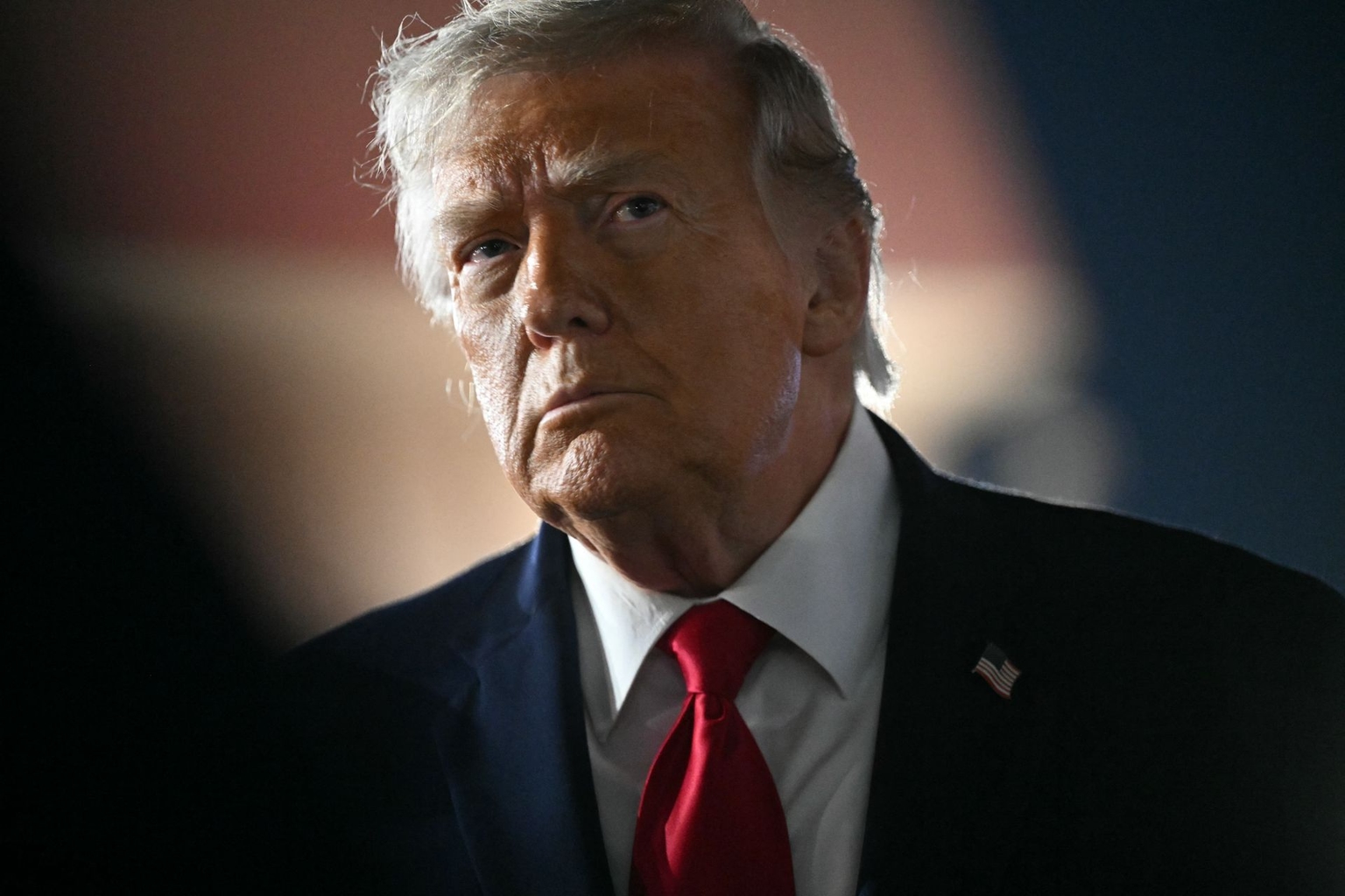 U.S. President Donald Trump speaks to the press before boarding Air Force One at John F. Kennedy International Airport in New York, on June 9, 2026