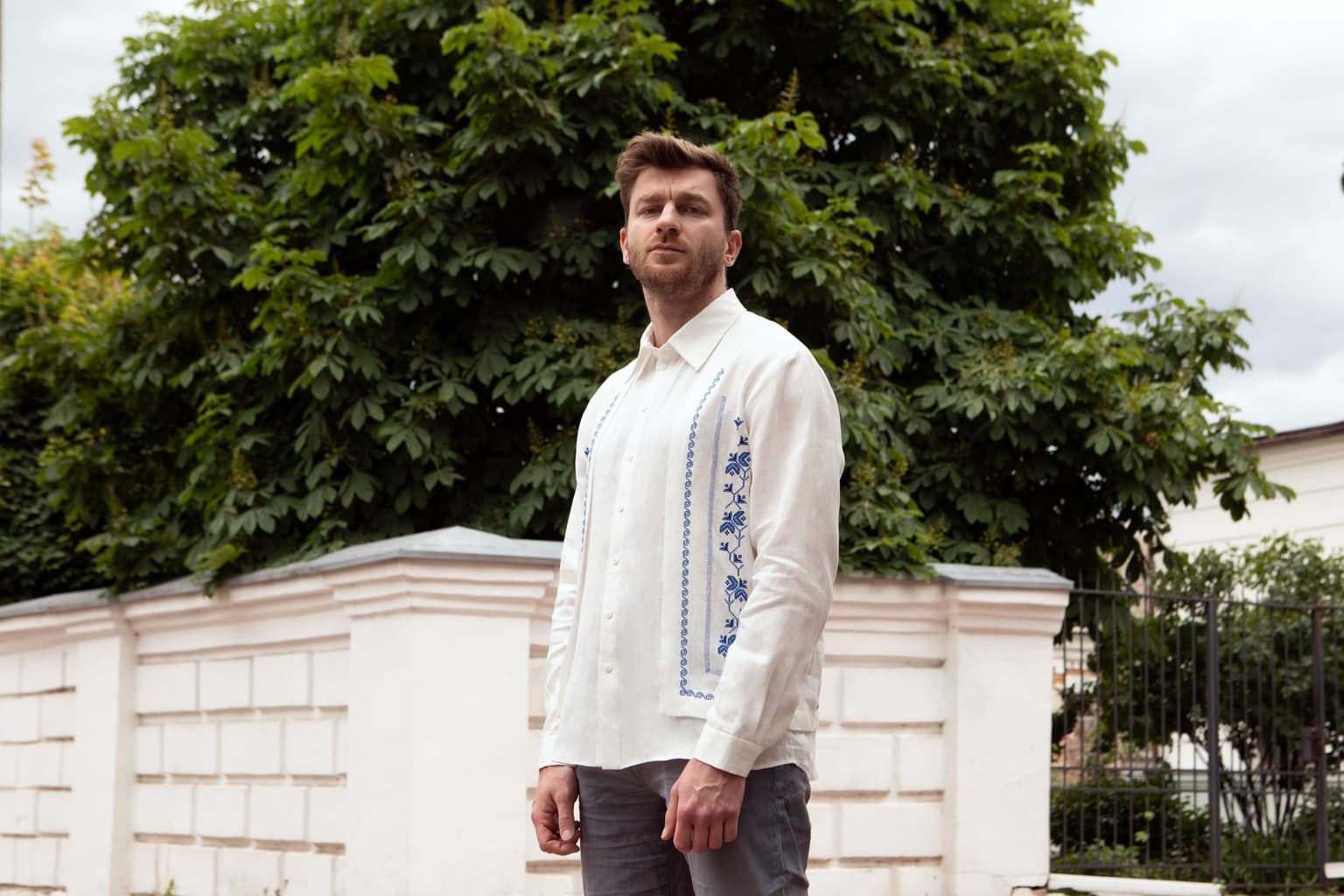 `The Kyiv Independent deputy chief editor Oleksiy Sorokin wearing the Kyiv Independent's first vyshyvanka
