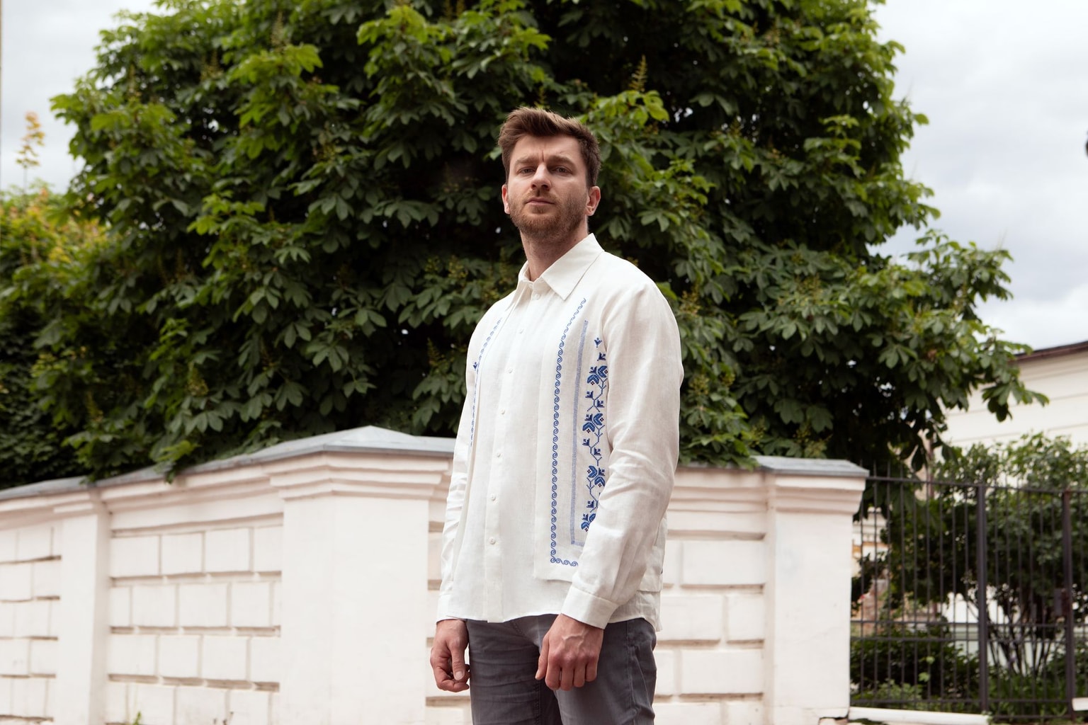 `The Kyiv Independent deputy chief editor Oleksiy Sorokin wearing the Kyiv Independent's first vyshyvanka