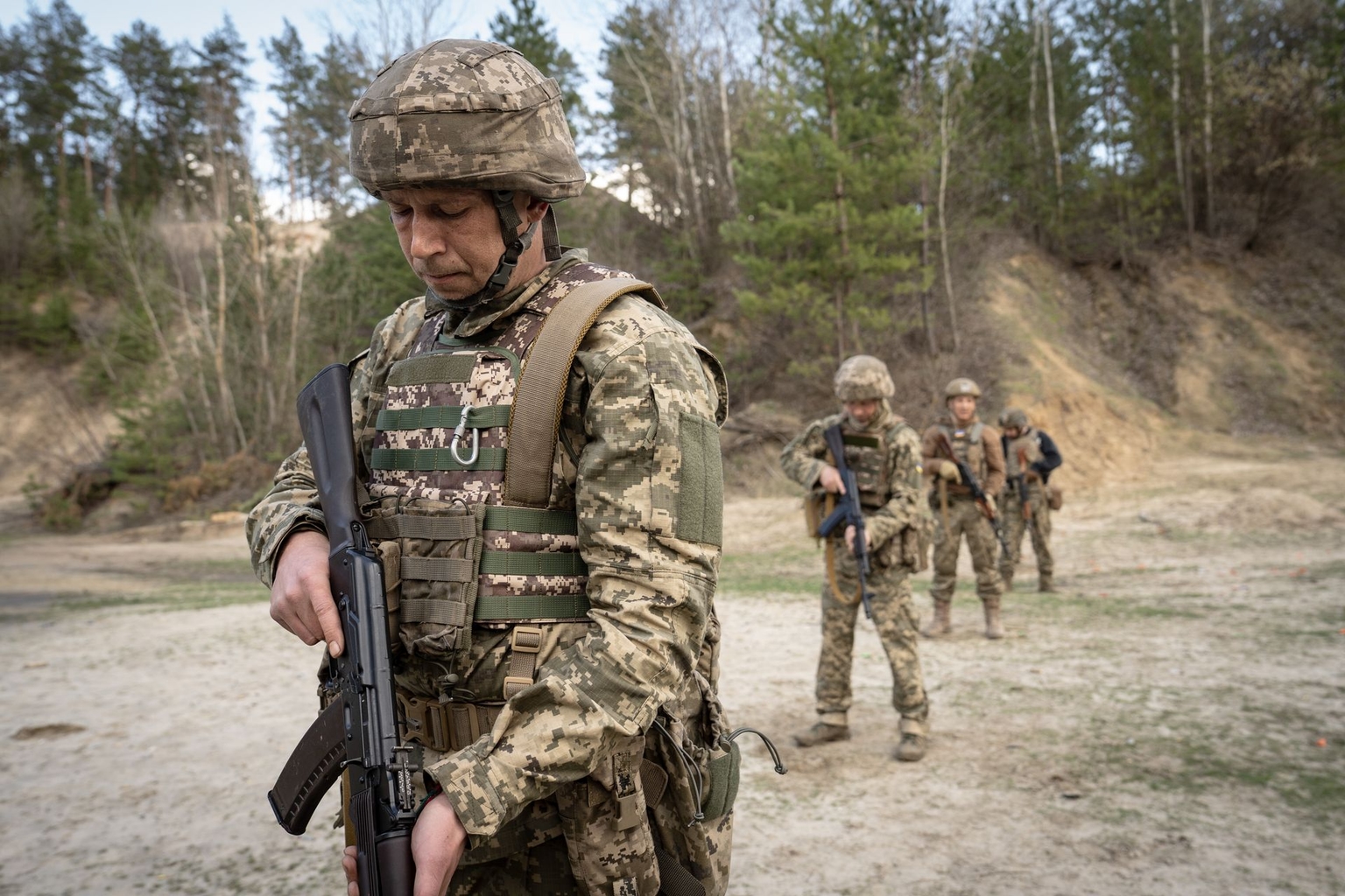 Recruits of Ukraine's 66th Mechanized Brigade at a shooting range during a two-week adaptation period in Kharkiv Oblast, Ukraine, on April 2, 2026.