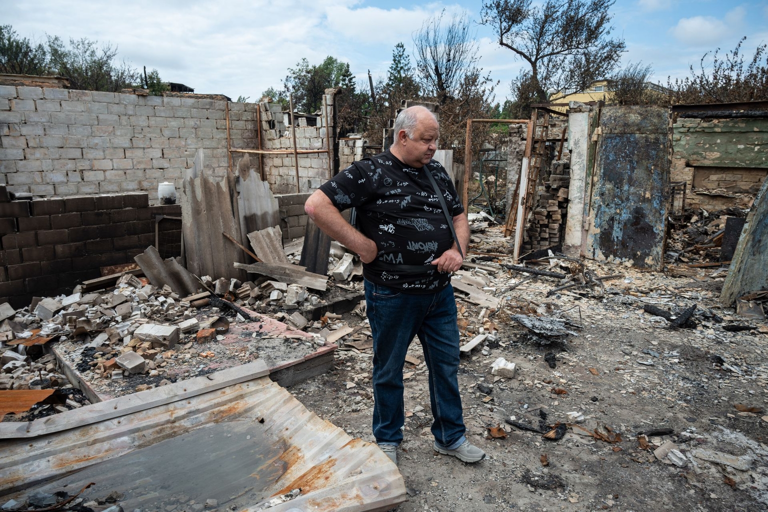 Vitalii Nikolaienko, 62, stands near his house in Vyshneve, Kyiv Oblast, Ukraine, on July 3, 2026.