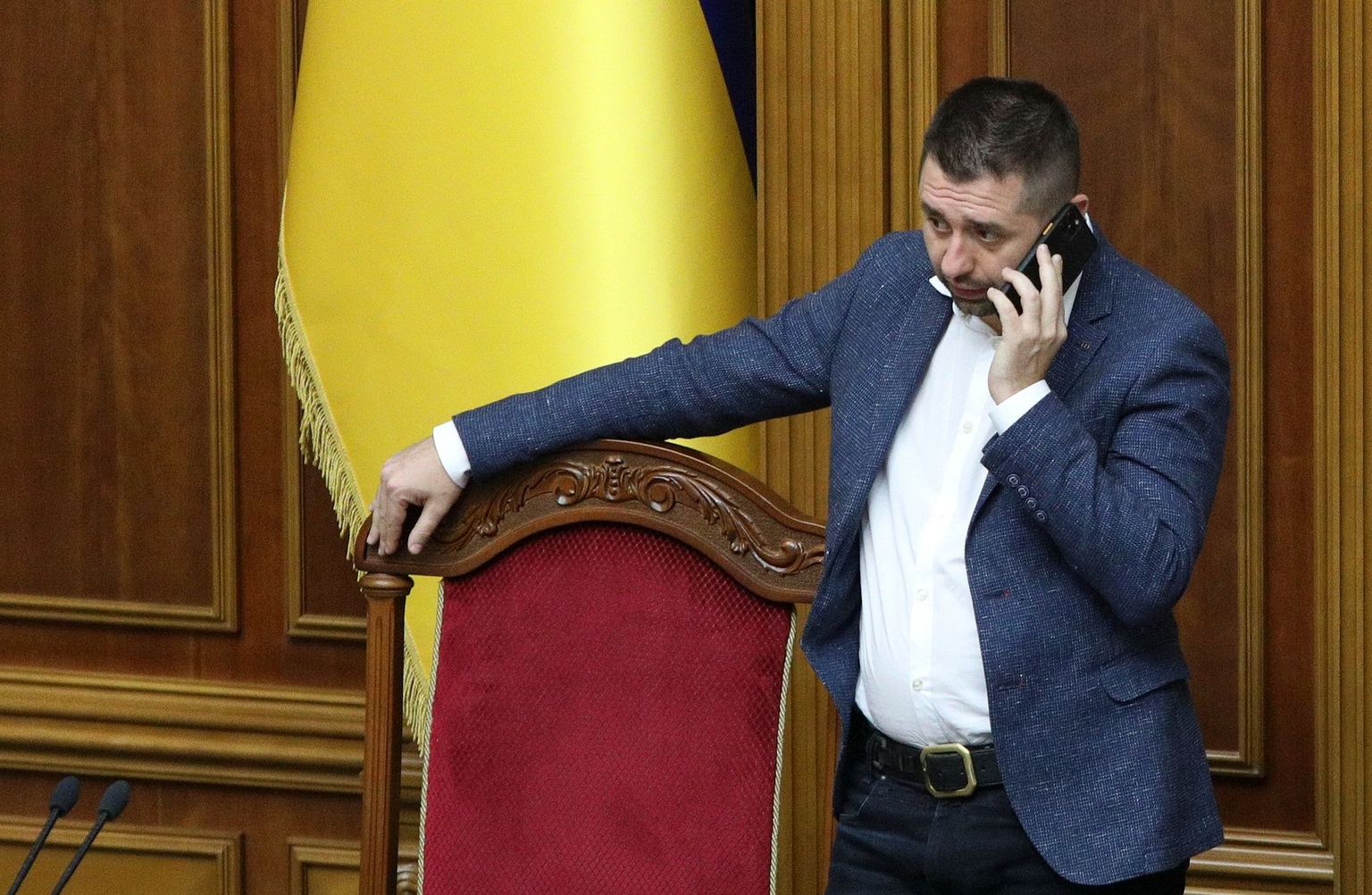 David Arakhamia, leader of the Servant of the People parliamentary faction, speaks on the phone during a session of the Verkhovna Rada in Kyiv, Ukraine, on Dec. 6, 2019.