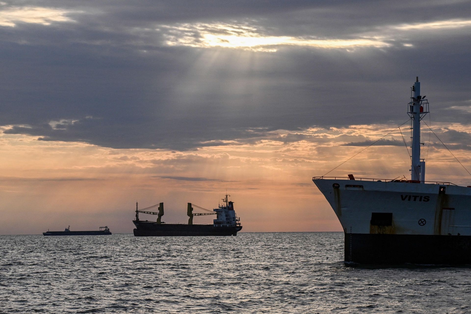 Ships anchored in one of the Danube River's outlets to the Black Sea, in Sulina, Romania, on June 8, 2022