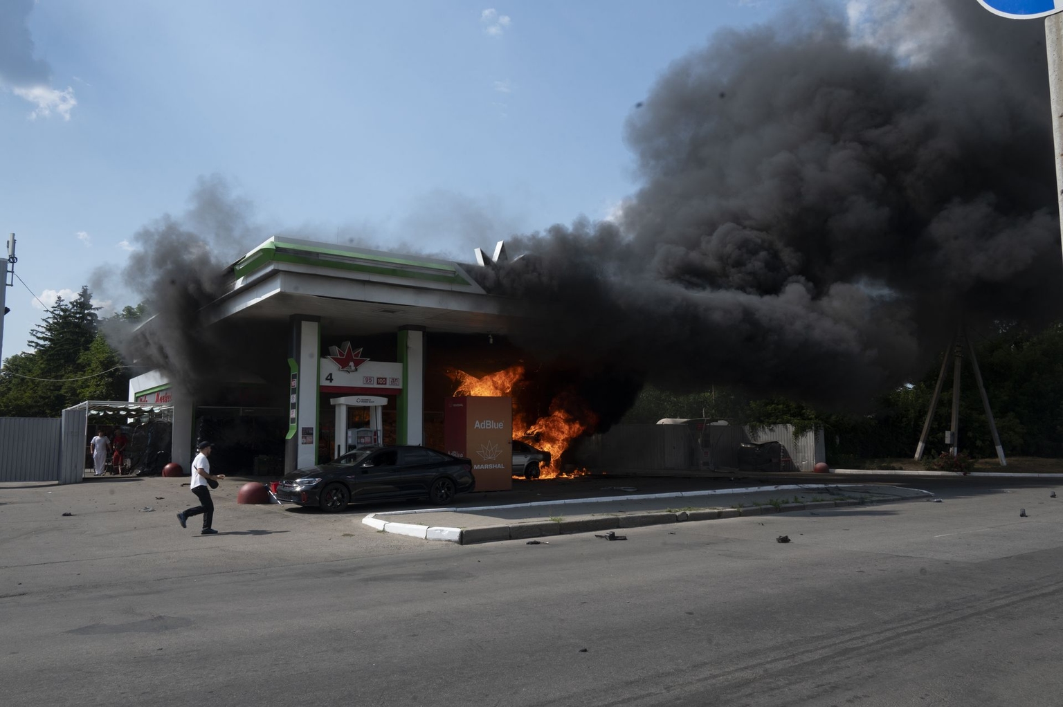 Flames rise on a gas station following a Russian UAV attack in Kharkiv, Ukraine, on July 3, 2026