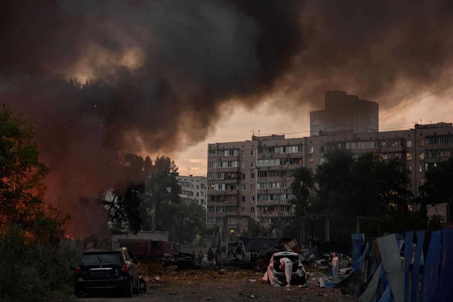 A garage cooperative burns near a suburban residential area after a Russian missile strike in Kyiv, Ukraine, on July 6, 2026.