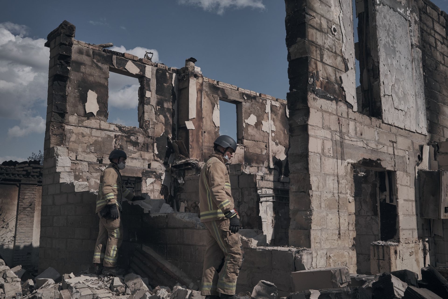 Rescuers, police, medics, and utility workers work at the site of a Russian night attack in Vyshneve, Kyiv Oblast, Ukraine, on July 6, 2026.