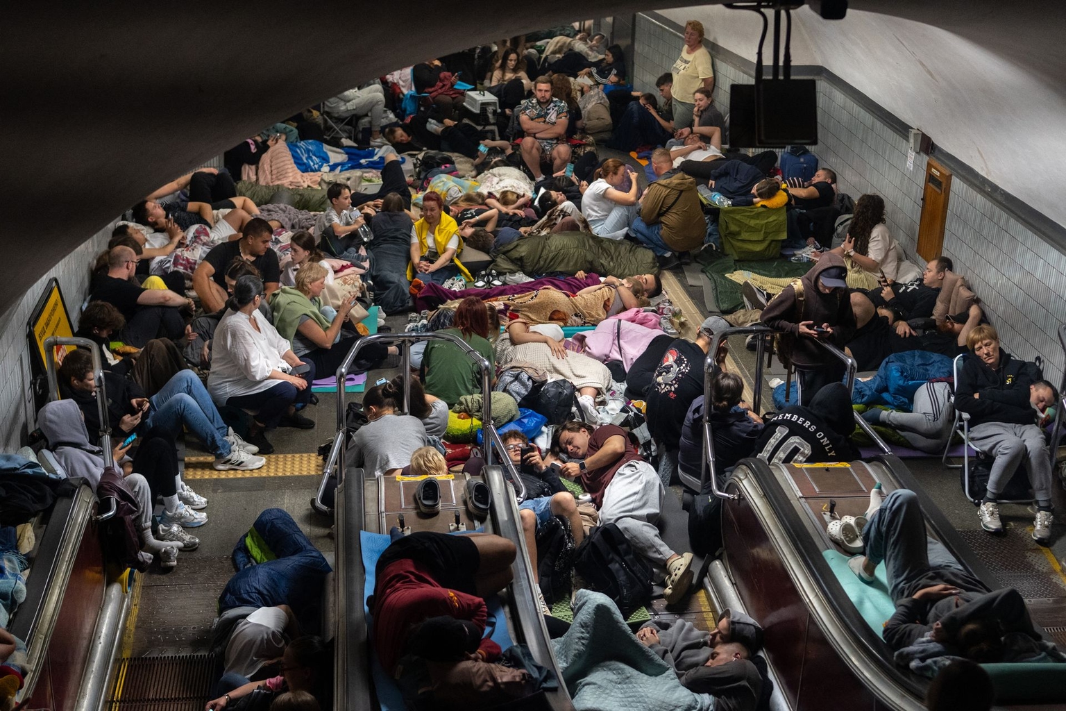 People take shelter at a metro station during a Russian missile strike on Kyiv, Ukraine, early on July 30, 2026.