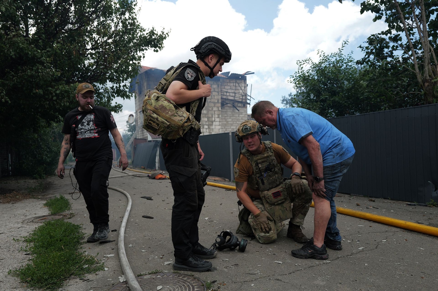 A local resident receives medical attention at the site of a Russian attack in Vyshneve, Kyiv Oblast, Ukraine, on July 6, 2026.