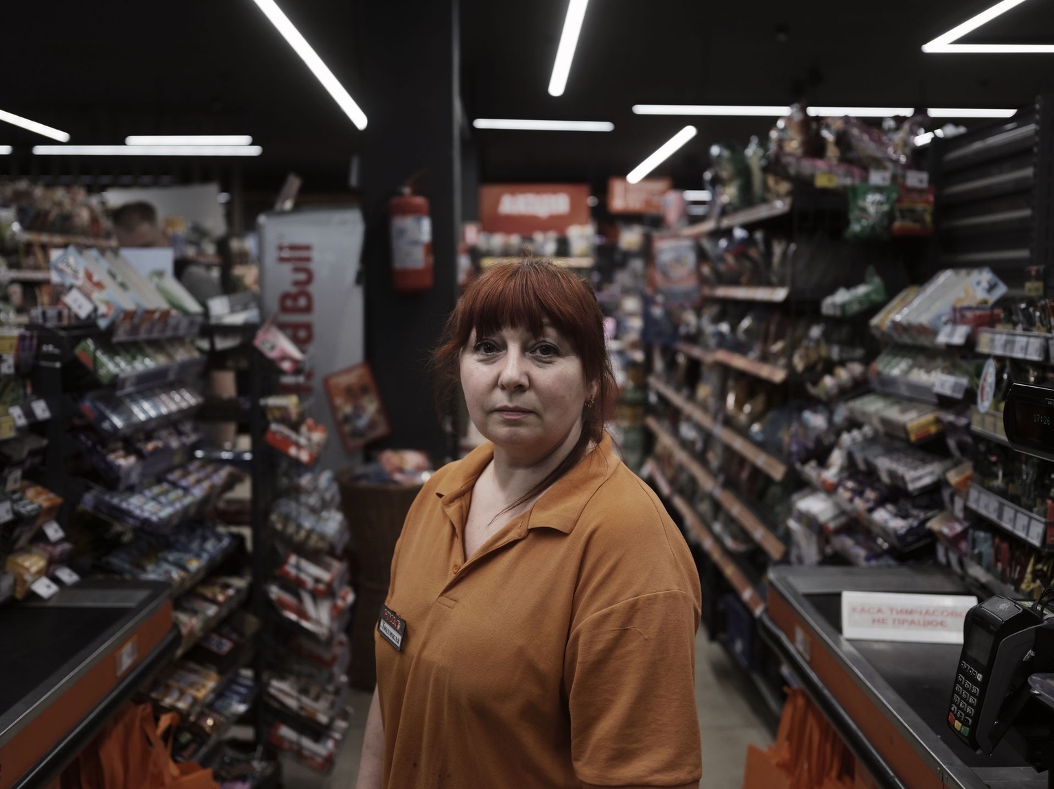 Clerk Lyudmila Drovko, 50, works at Chudo Market in Kramatorsk, Ukraine, on August 17, 2026.