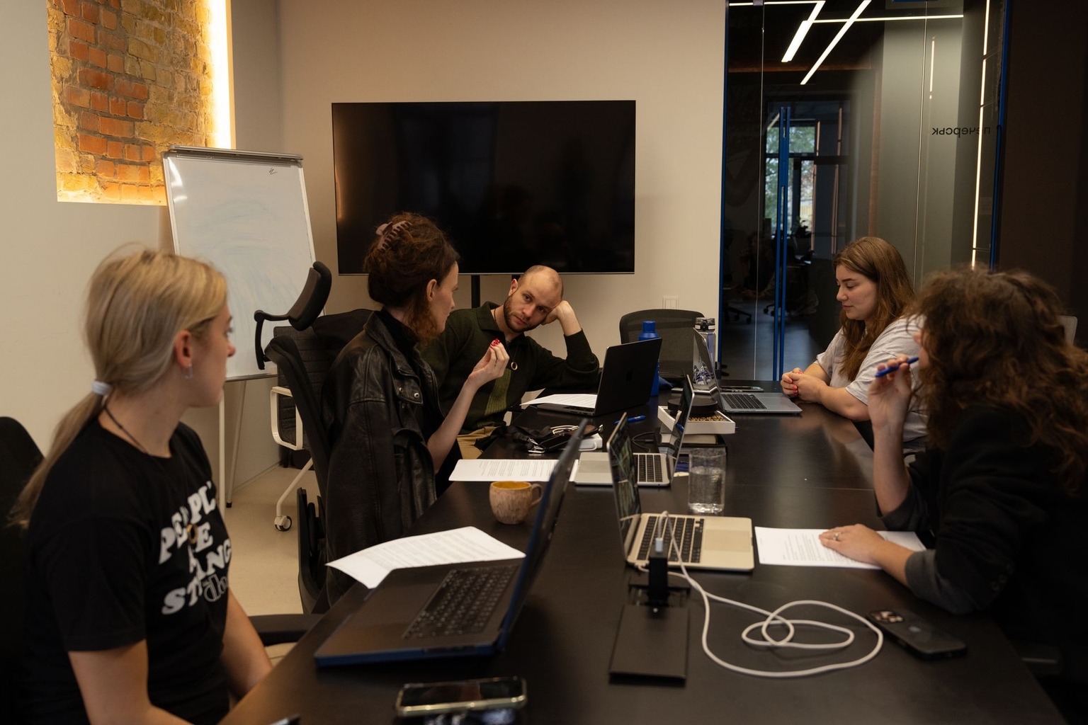 The Kyiv Independent team during a preparation meeting ahead of a live event in London
