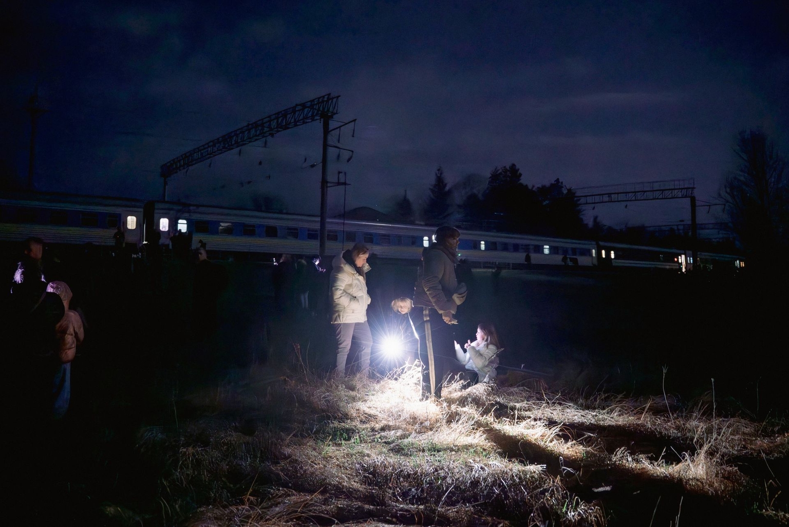 Passengers of the Kharkiv-Vorokhta train are evacuated from the cars due to the danger of a Russian drone attack, in Poltava Oblast, Ukraine, on April 1, 2026.