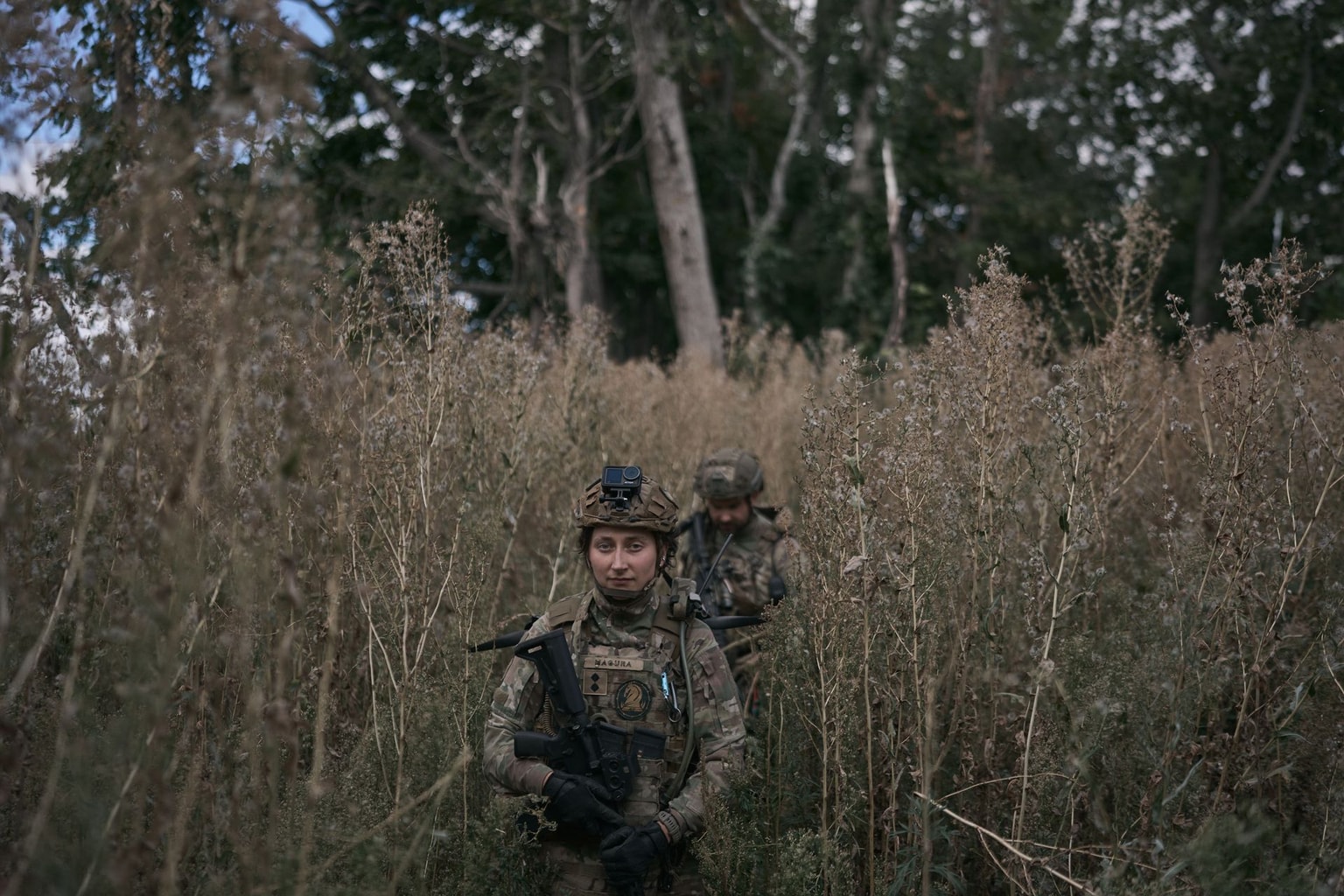 Ukrainian soldiers return to their command post in Sumy Oblast, Ukraine, on Aug. 28, 2026.