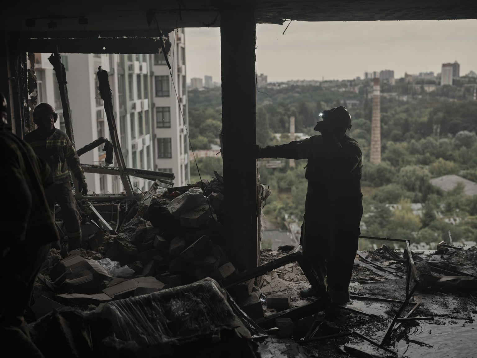 Firefighters work to extinguish a fire caused by a Russian drone strike at the Misto Kvitiv residential complex in Kyiv, Ukraine, on Sept. 1, 2026.