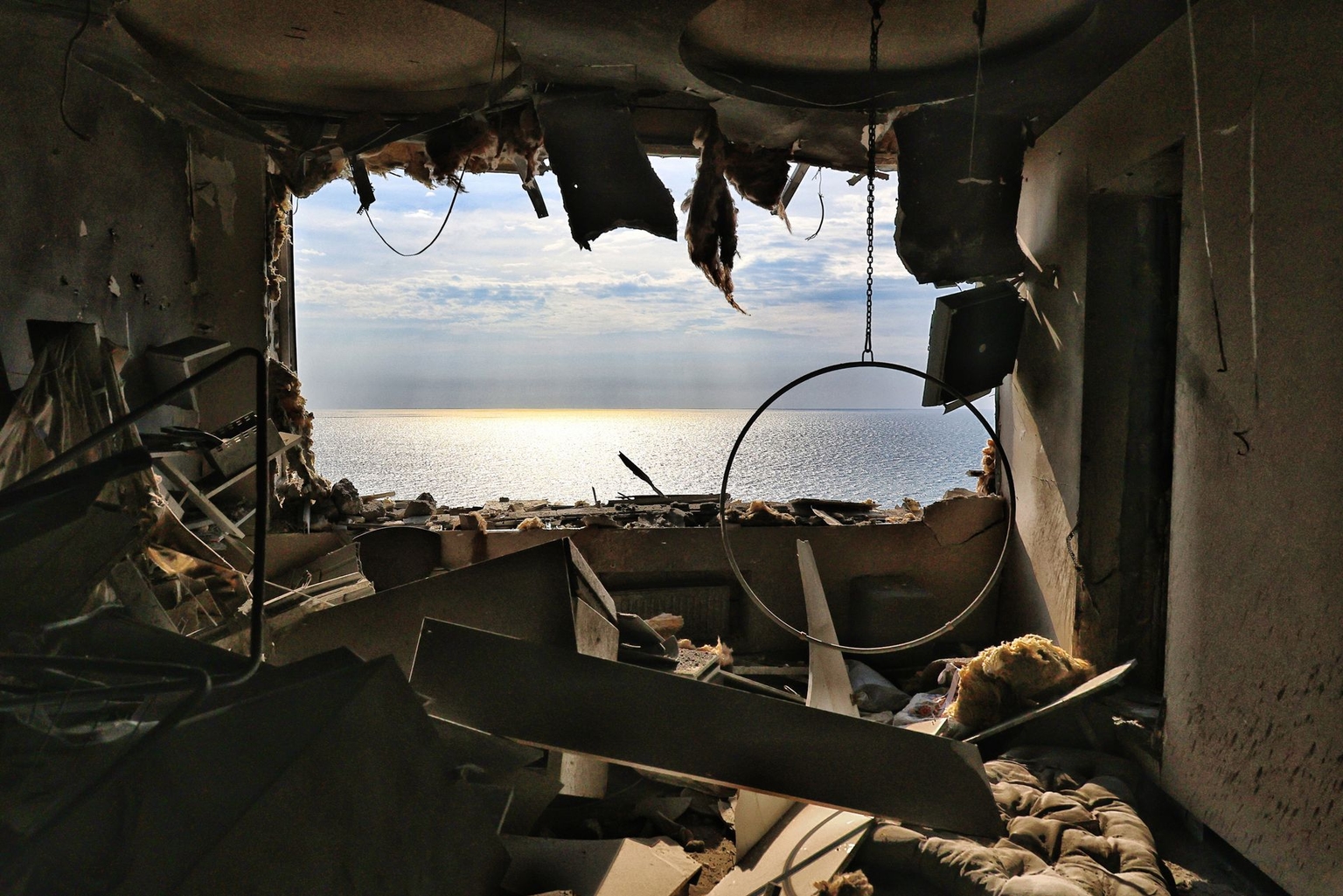 The Black Sea is visible through a destroyed apartment in Odesa, Ukraine, on September 3, 2026.