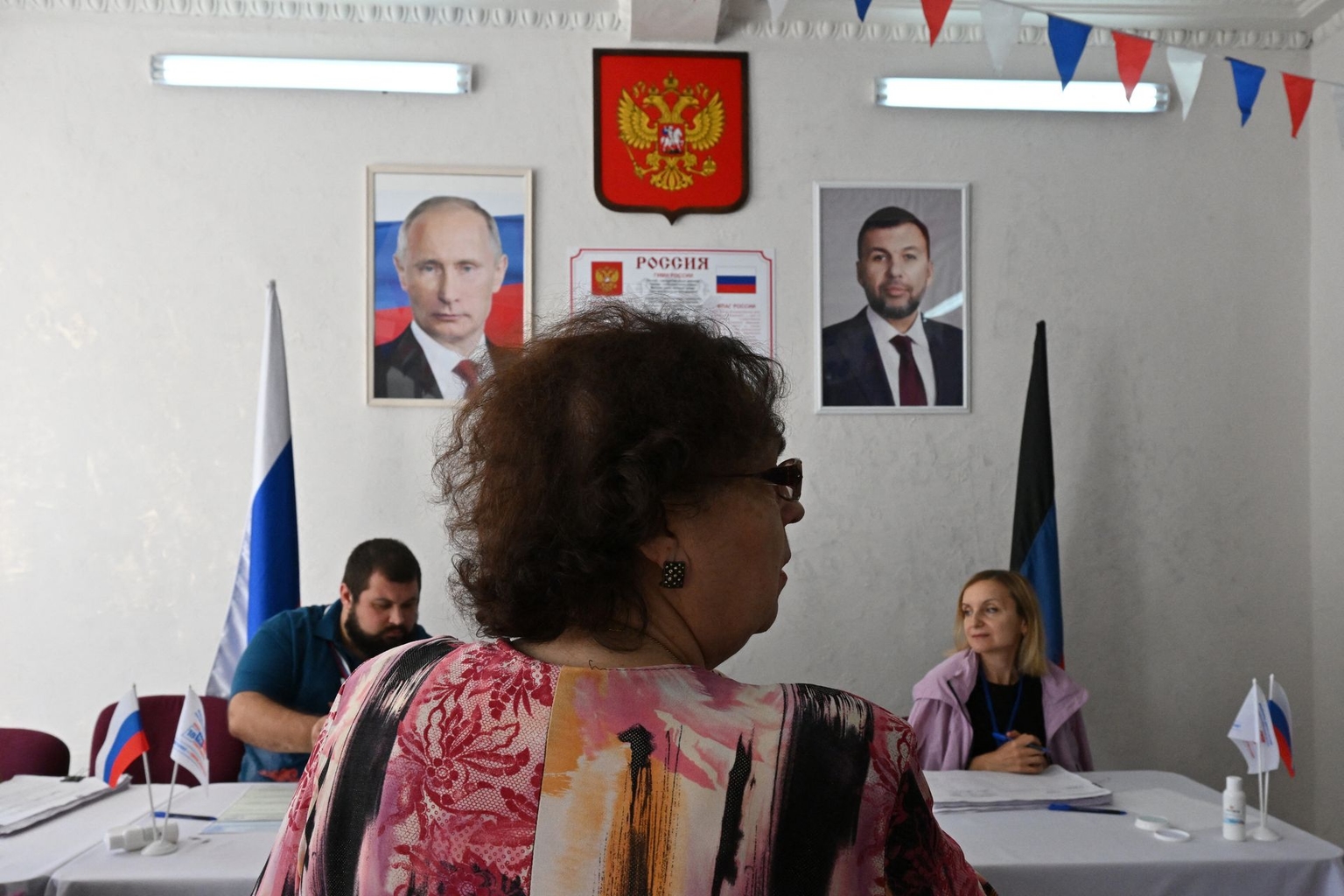 A woman votes at a polling station in Donetsk, Russian occupied part of Ukraine, on September 20, 2026.