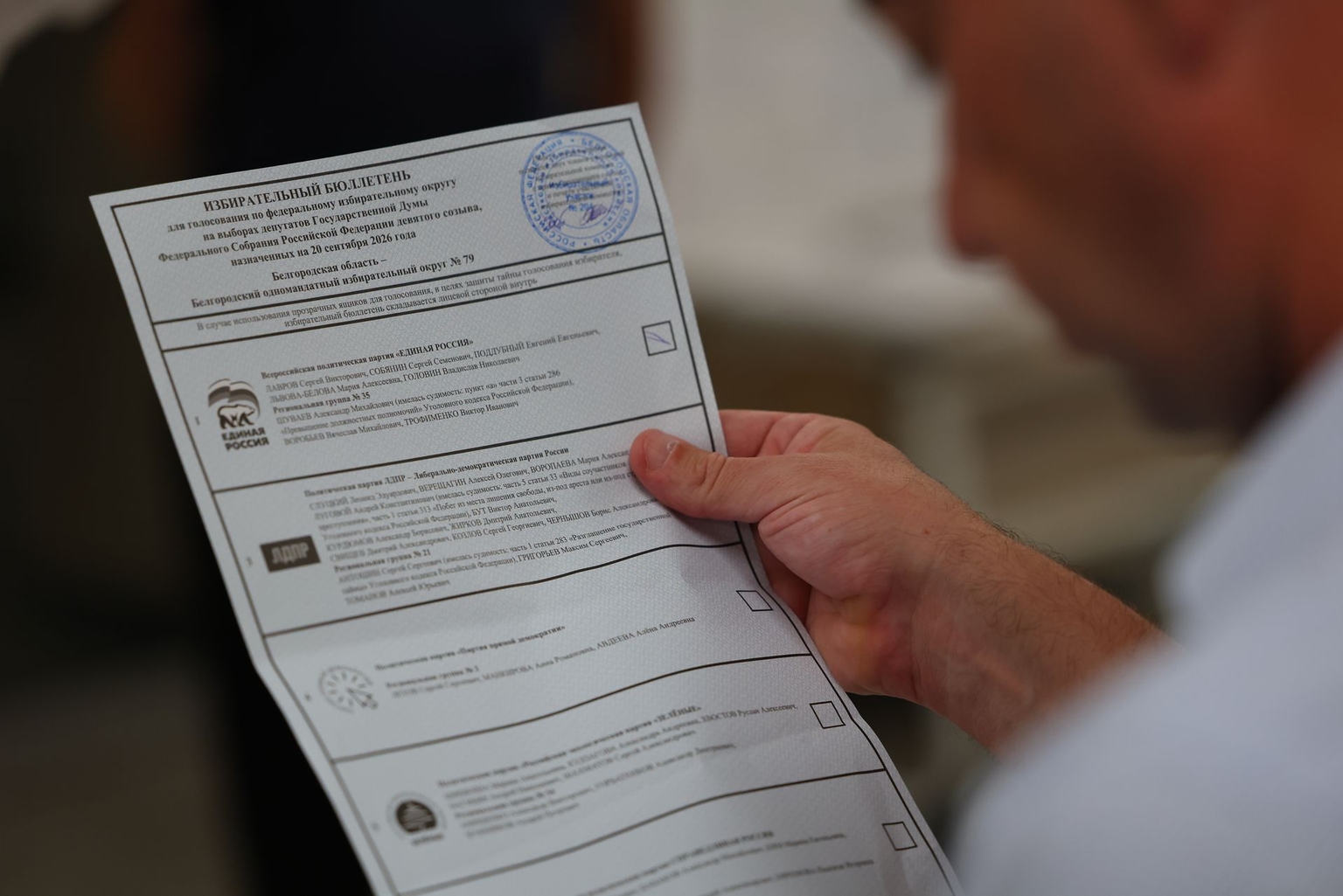 Electoral commission members count votes at a polling station in Belgorod, Russia, on September 20, 2026.