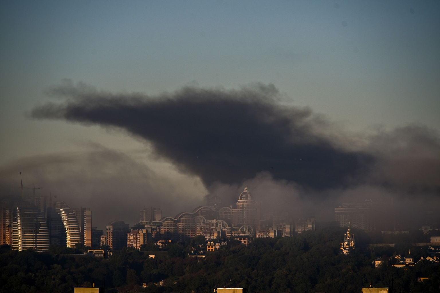 A plume of black smoke rises after a Russian drone attack in Kyiv, Ukraine, on Sept. 23, 2026.