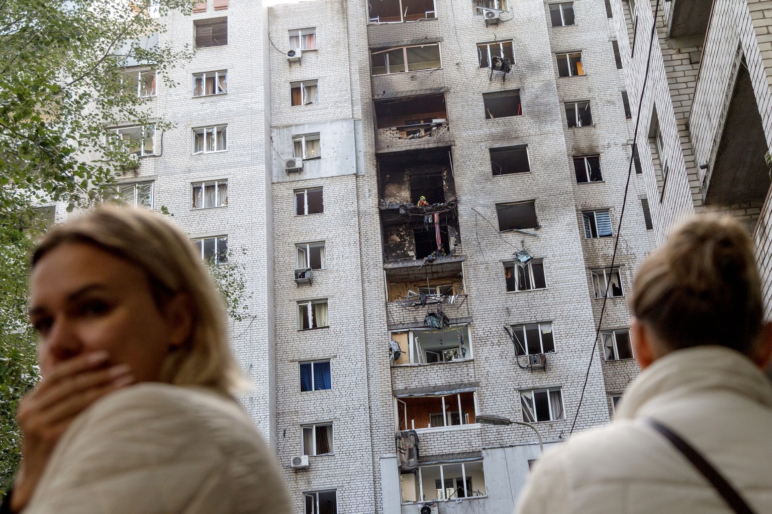 Rescuers work at an apartment building in Kyiv, Ukraine, on Sept. 25, 2026.