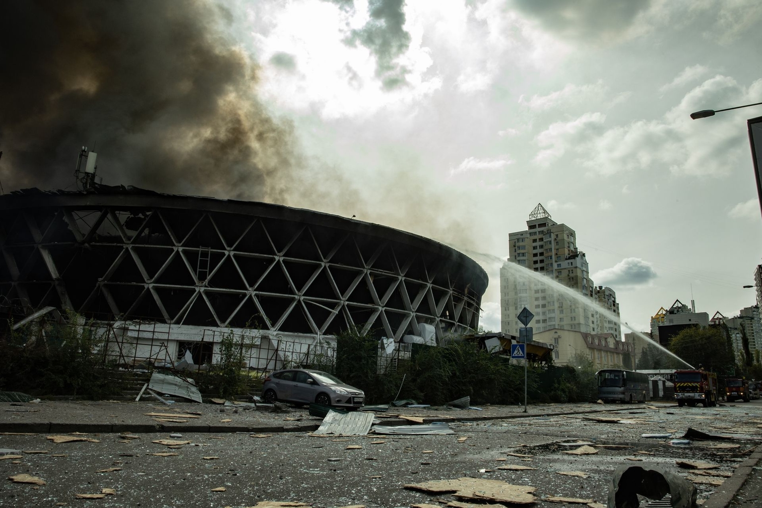 Firefighters extinguish a fire in a market building in Kyiv, Ukraine, on Sept. 23, 2026.