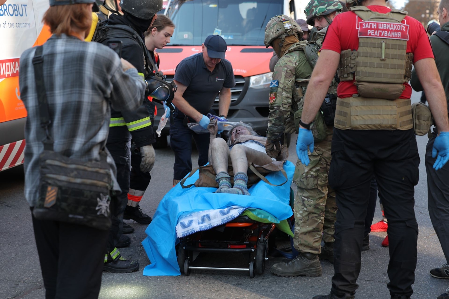 Rescuers help a wounded person on a stretcher after a Russian drone strike in Kyiv, Ukraine, on Sept. 28, 2026.