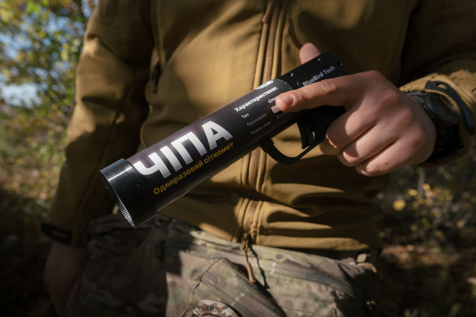 A soldier holds a Chipa net gun in unnamed location, Ukraine, on Oct. 20, 2026.