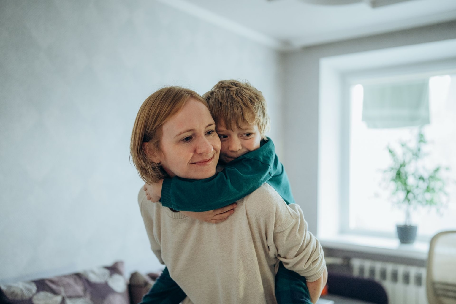 Anna Ablitsova poses for a portrait with her 4-year-old son, Mykyta, at their home in Lutsk, Ukraine, on Oct. 17, 2026.