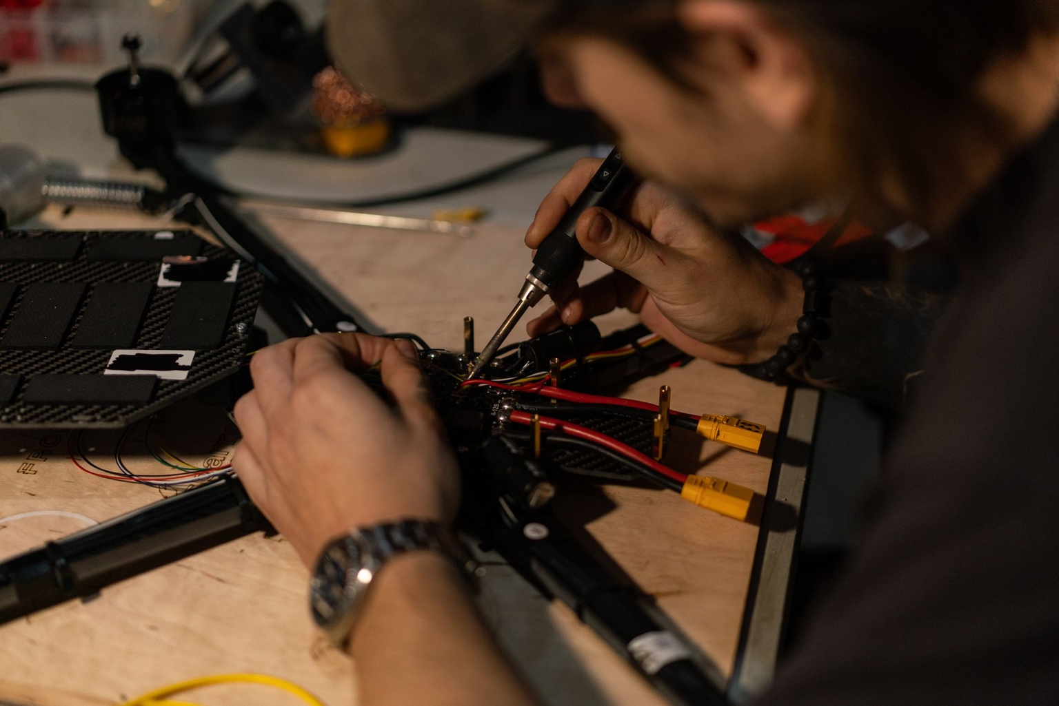 Soldiers of Ukraine’s Khartiia Brigade repair FPV drones at an unnamed location in Kharkiv Oblast, Ukraine, on Sept. 5, 2026.