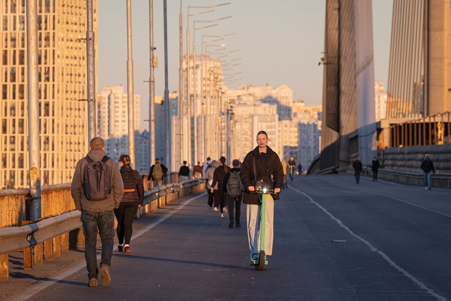 People cross a bridge during an air raid alert in Kyiv, Ukraine, on Oct. 2, 2026.