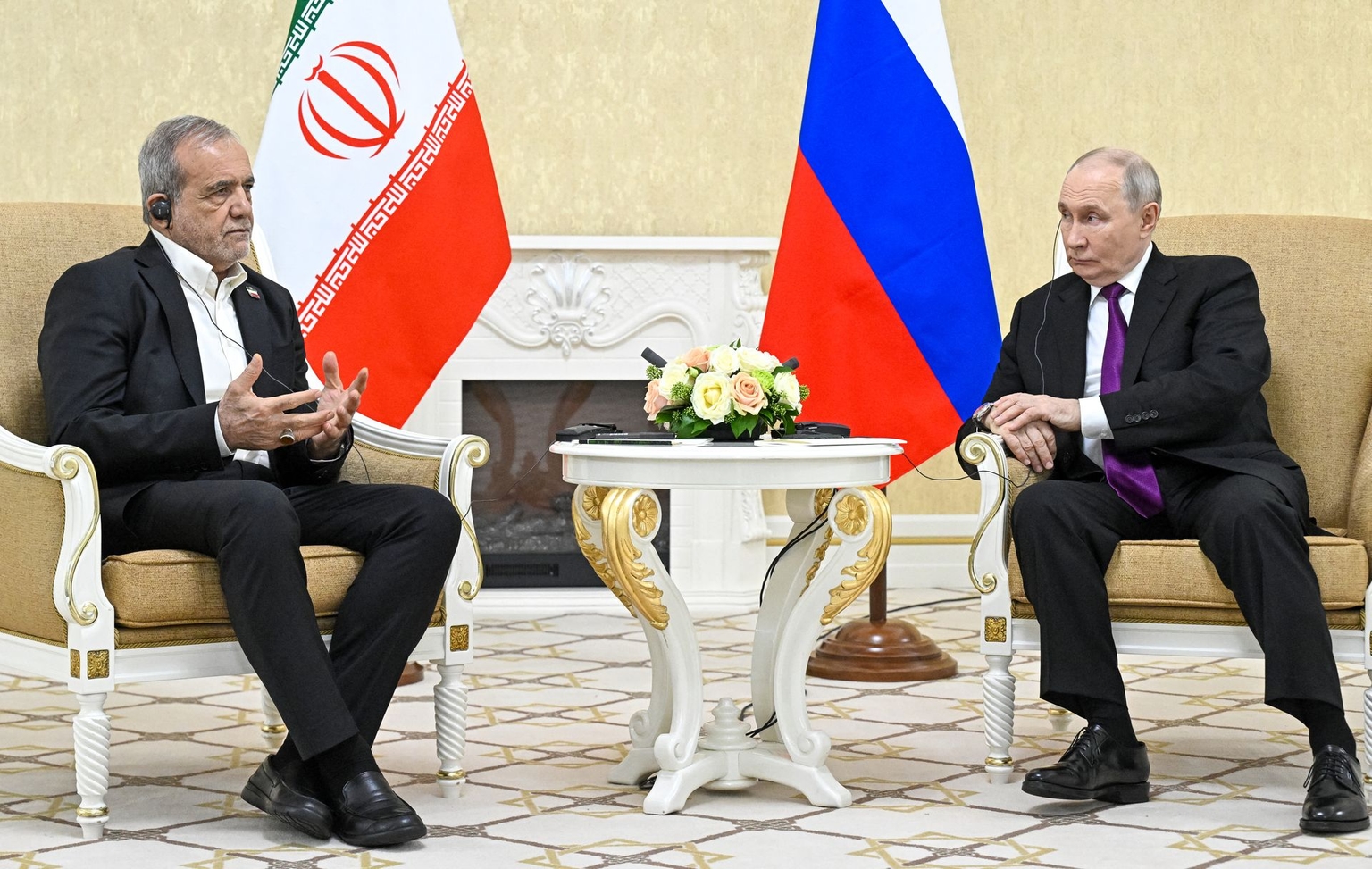 Russian President Vladimir Putin and Iranian President Masoud Pezeshkian hold a meeting in Turkmenbashi, Turkmenistan, on Oct. 8, 2026.