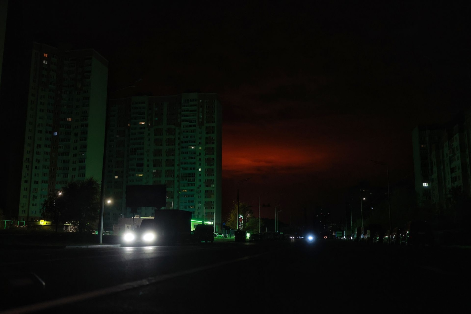 Residential buildings stand dark during a blackout in Kyiv, Ukraine, on Oct. 11, 2026.